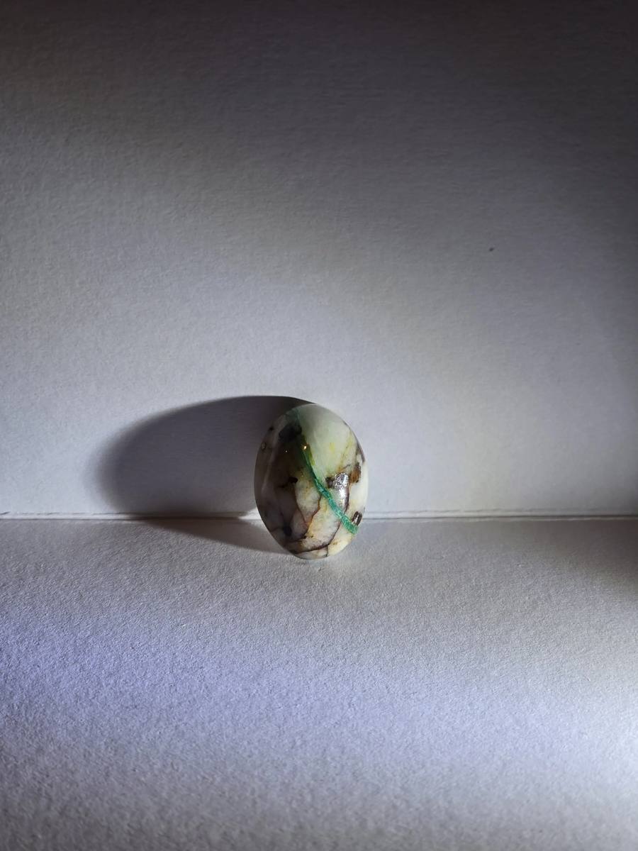 oval chrysocolla in quartz teal vein — front