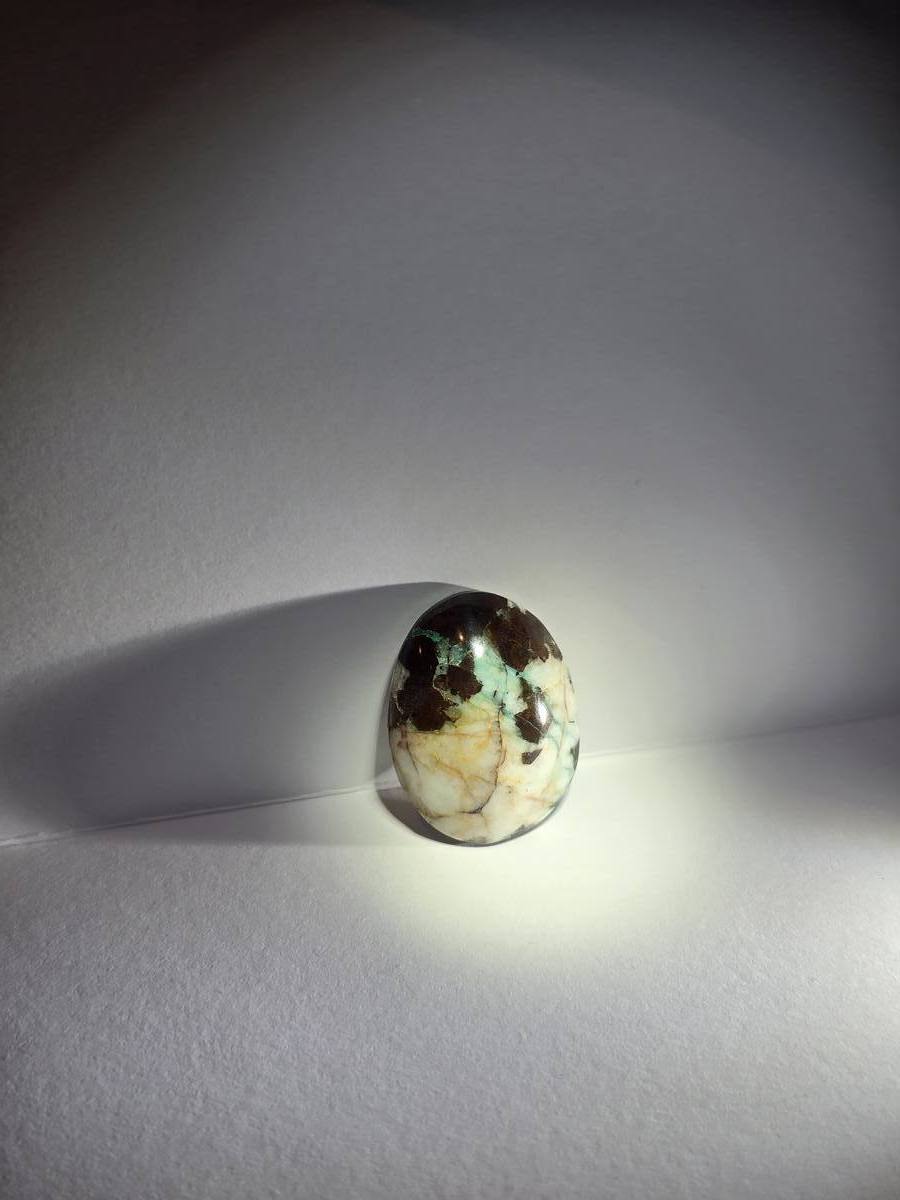 oval chrysocolla in quartz jasper matrix — back