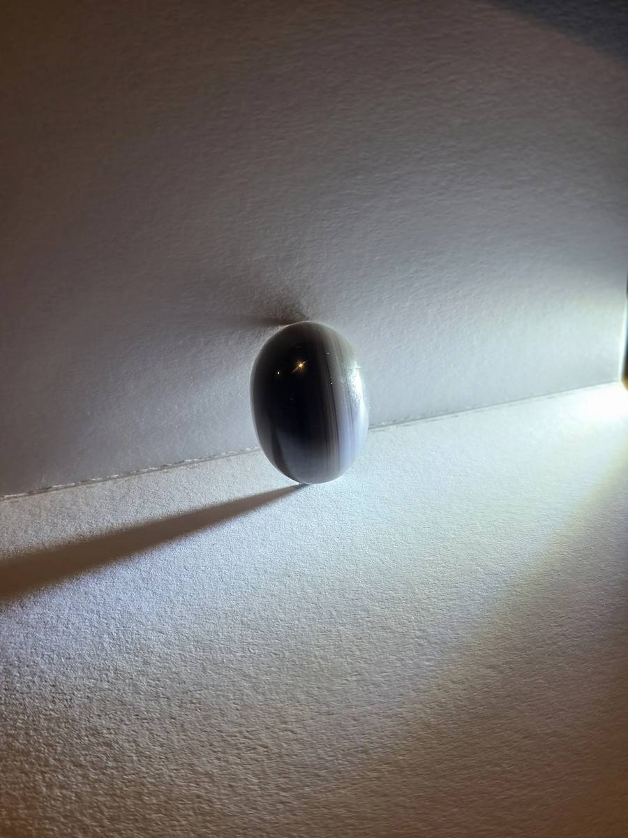 oval silver sheen obsidian gumdrop — front